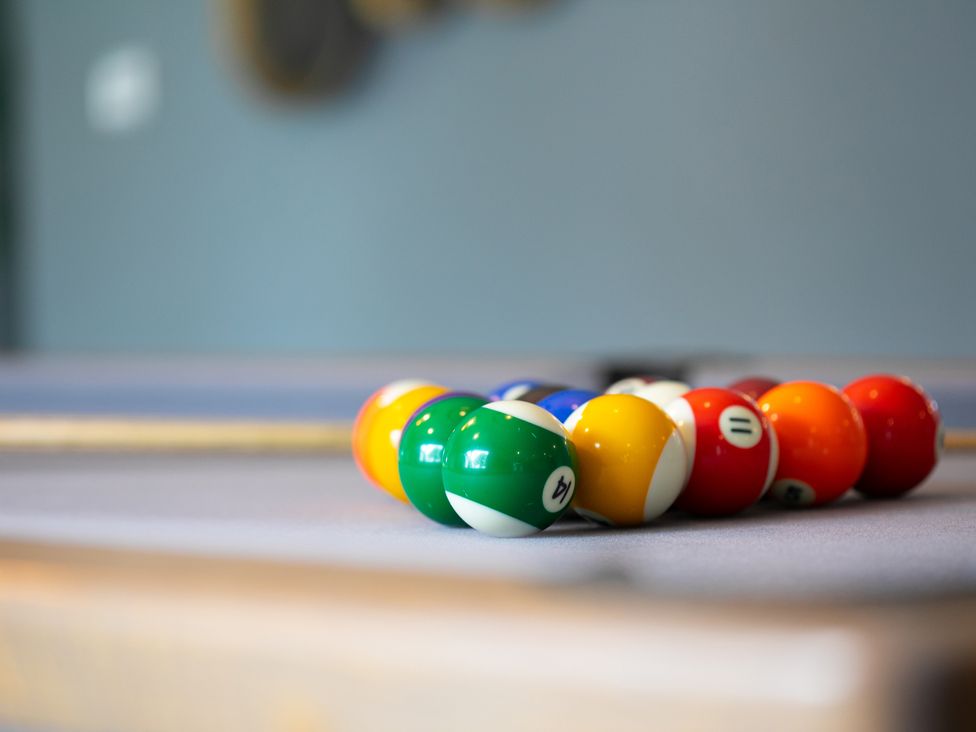A set of billiard balls arranged on a pool table at Huxham View and Annex in Stoke Canon